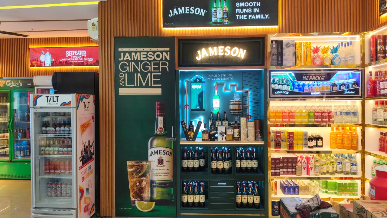 Well-lit liquor retail outlet showcasing premium alcohol brands
