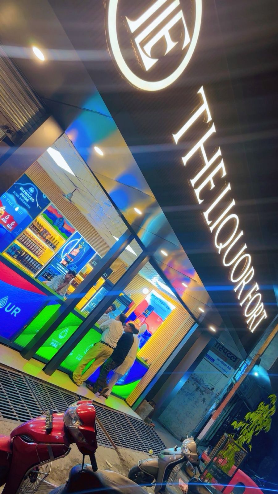 Local liquor counter shop in Uttar Pradesh selling whisky, rum, and beer