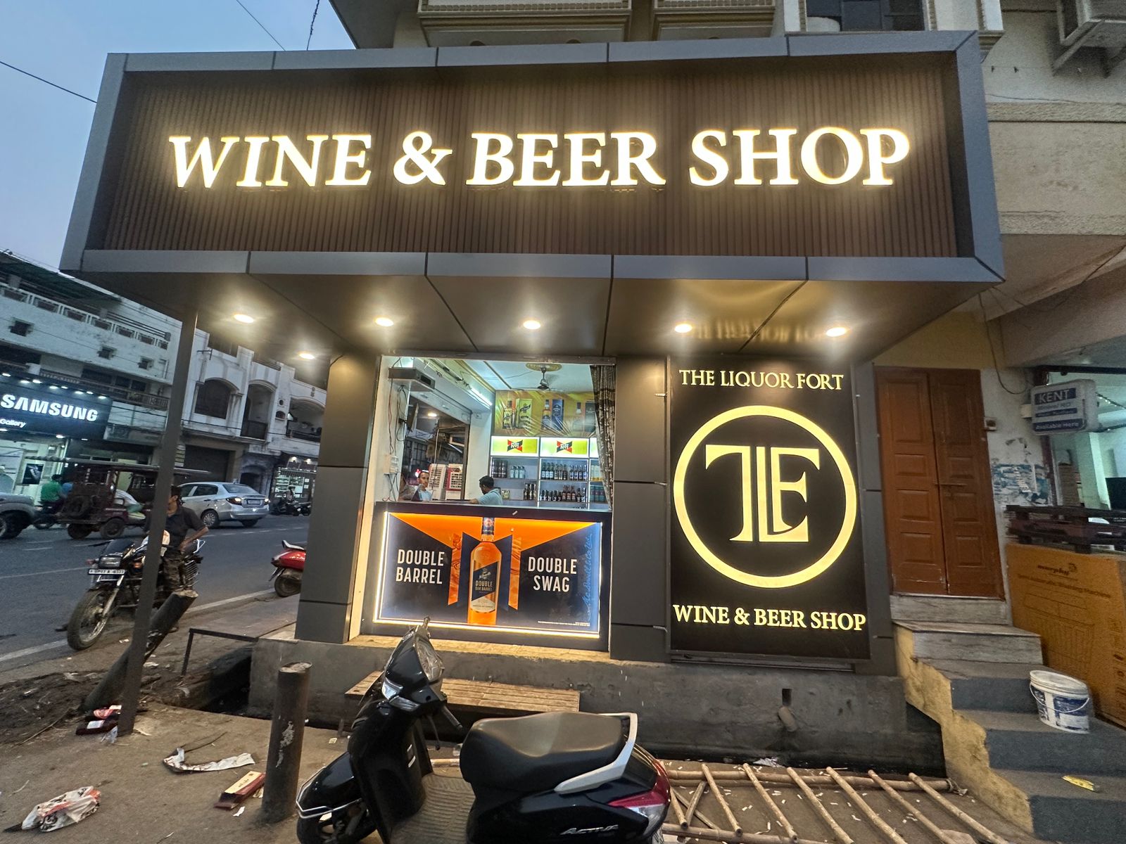 Street-side liquor store counter with bottle display