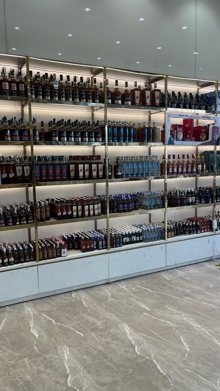 Premium liquor shelves with whisky, rum, vodka