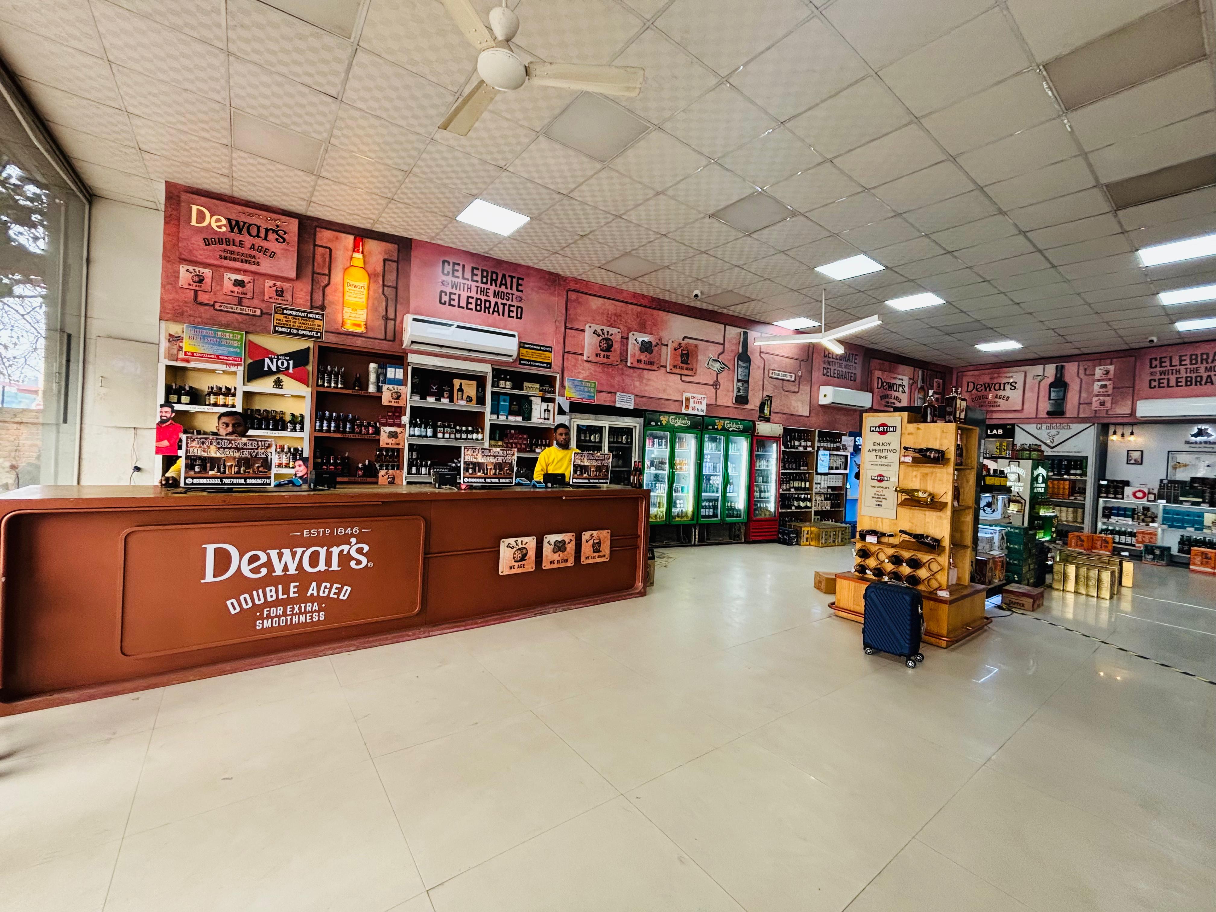 Curated whisky and wine collection at G-Town Wines Sector 39