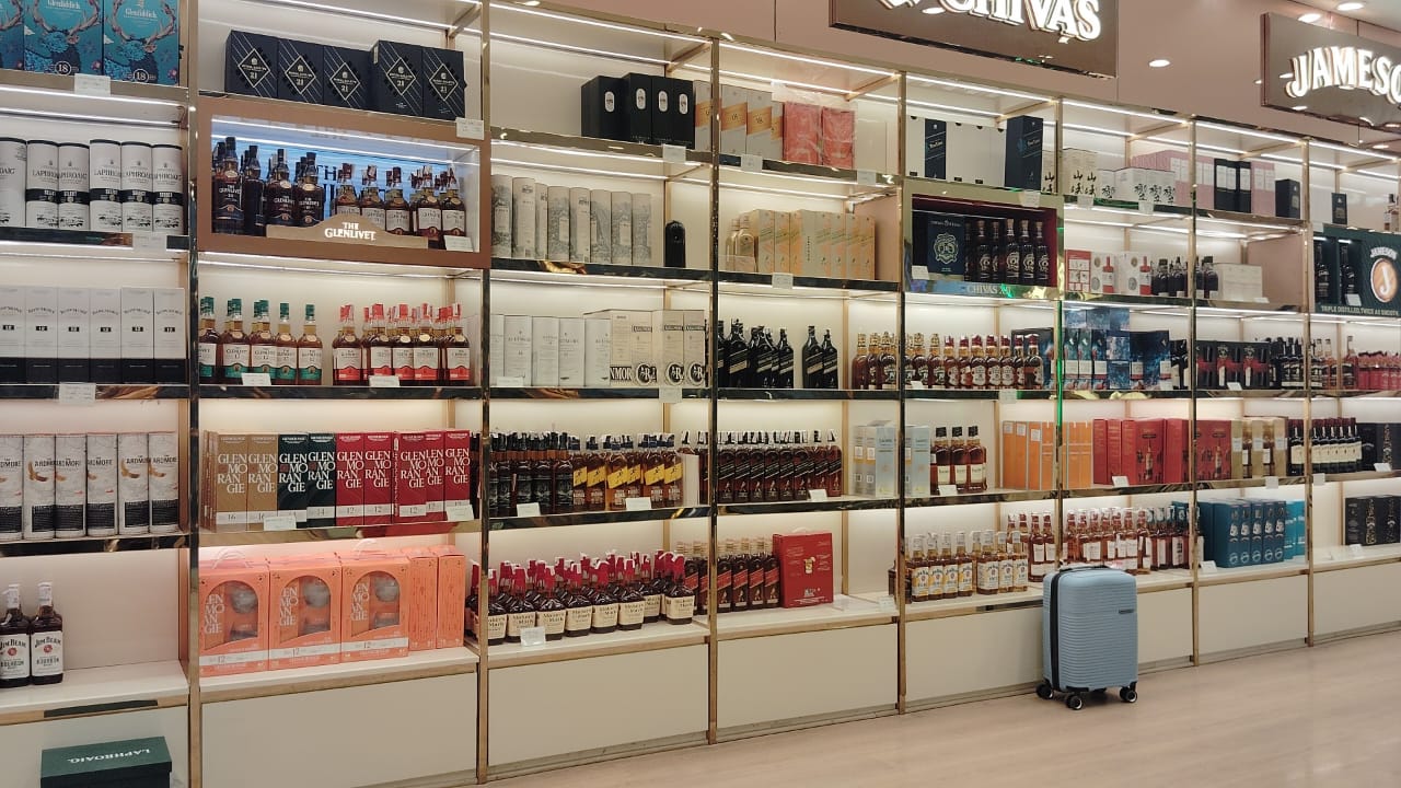 Premium whisky shelf with single malts and rare bottles at Shyam Wines