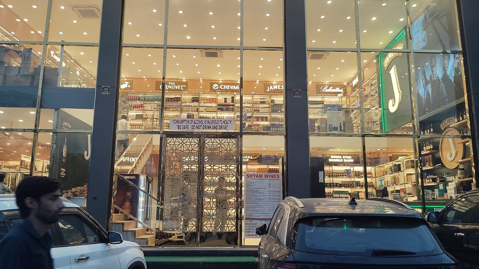 Premium liquor counter with curated alcohol brands at Shyam Wines