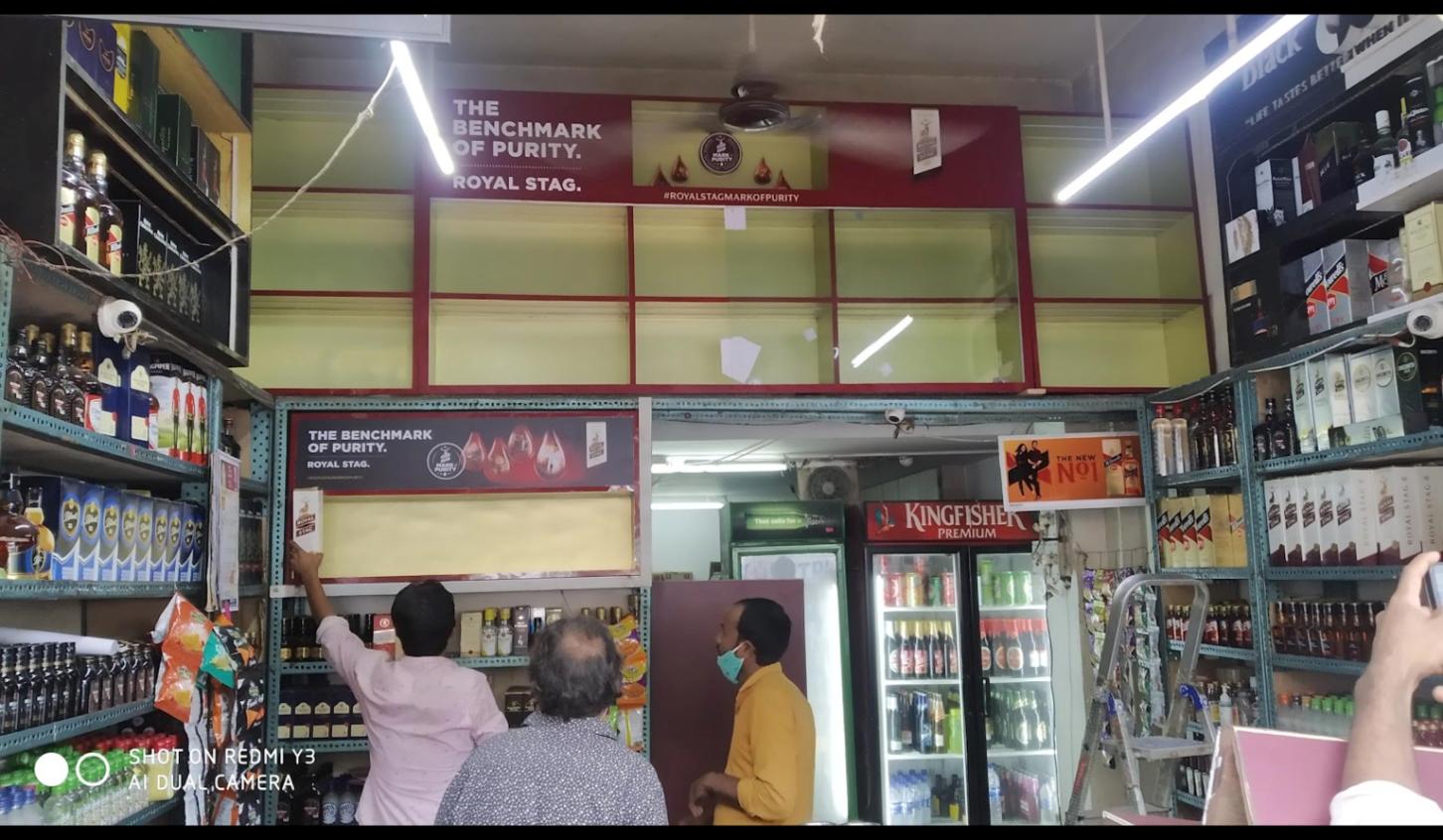 Vijay Wines counter with Kingfisher beer fridge and premium spirits, Ghatkopar